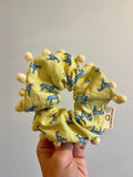 Pom pom scrunchie